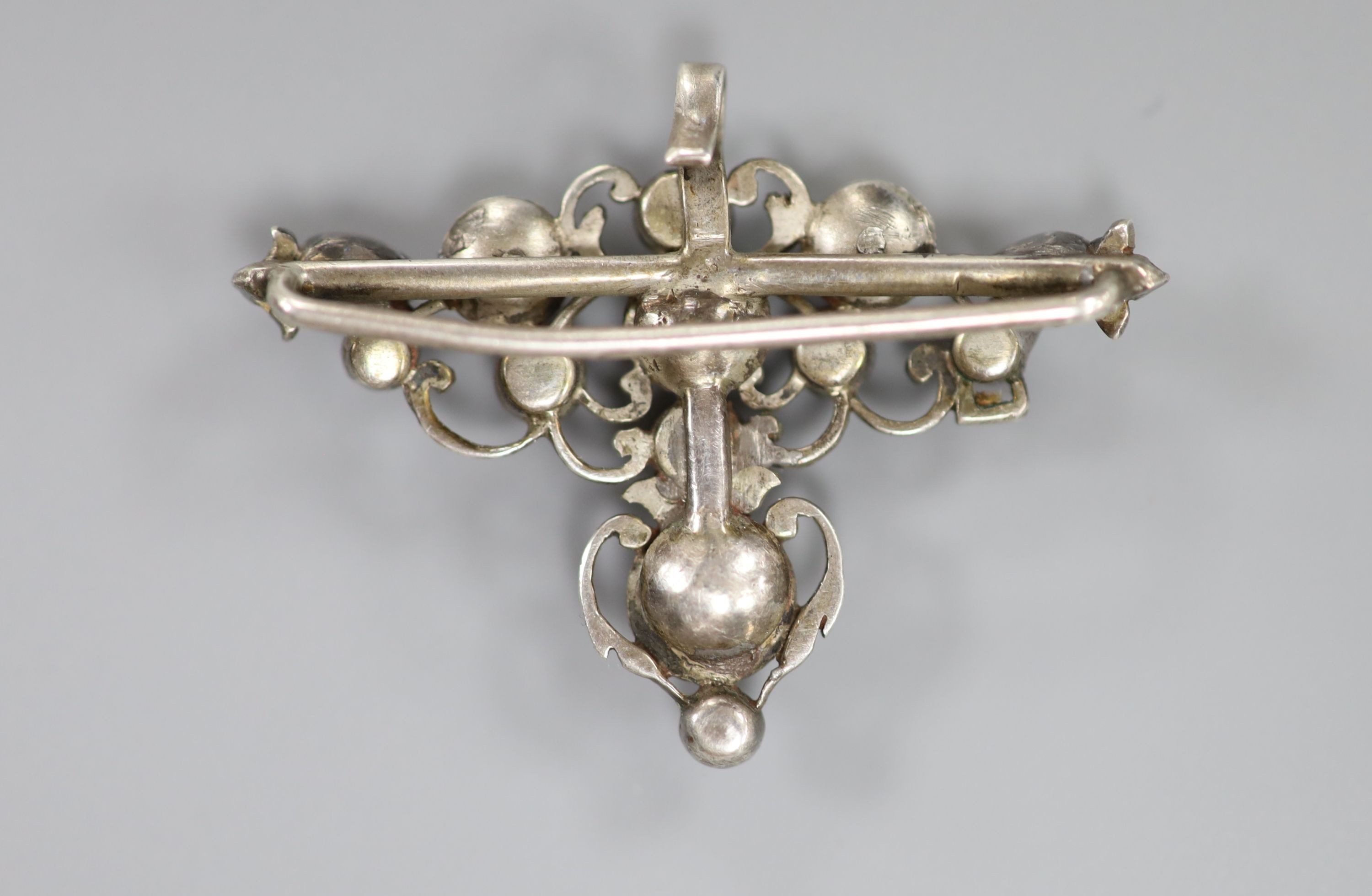 A 19th century white metal, garnet and pearl set pendant, width 45mm.